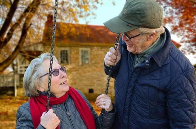 picture of an elderly couple looking at each other